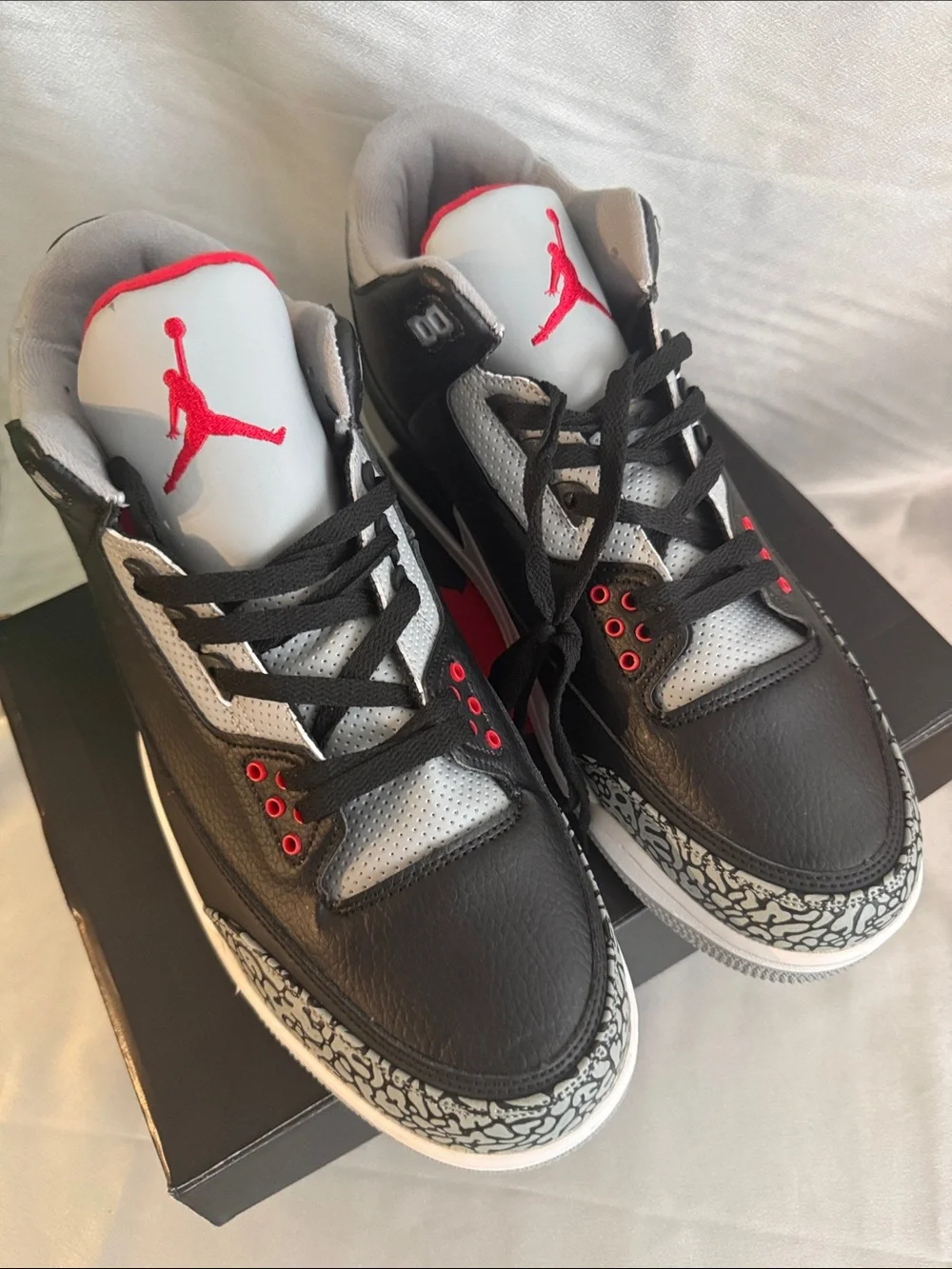 New! Air Jordan 3 Retro Black Cement sneaker featuring black leather!